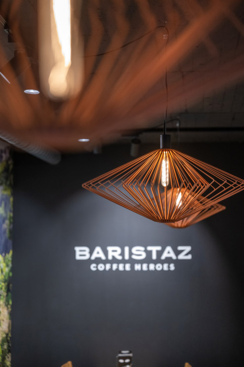 Fimenlogo mit Details der Lampe